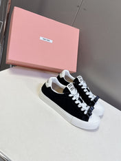 MIUMIU 25S SNEAKERS IN BLACK SUEDE