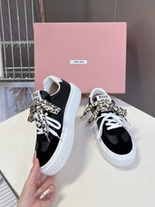 MIUMIU 25S SNEAKERS 45MM IN BLACK SUEDE WITH LEOPARD-PRINT LACES