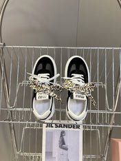MIUMIU 25S SNEAKERS 45MM IN BLACK SUEDE WITH LEOPARD-PRINT LACES