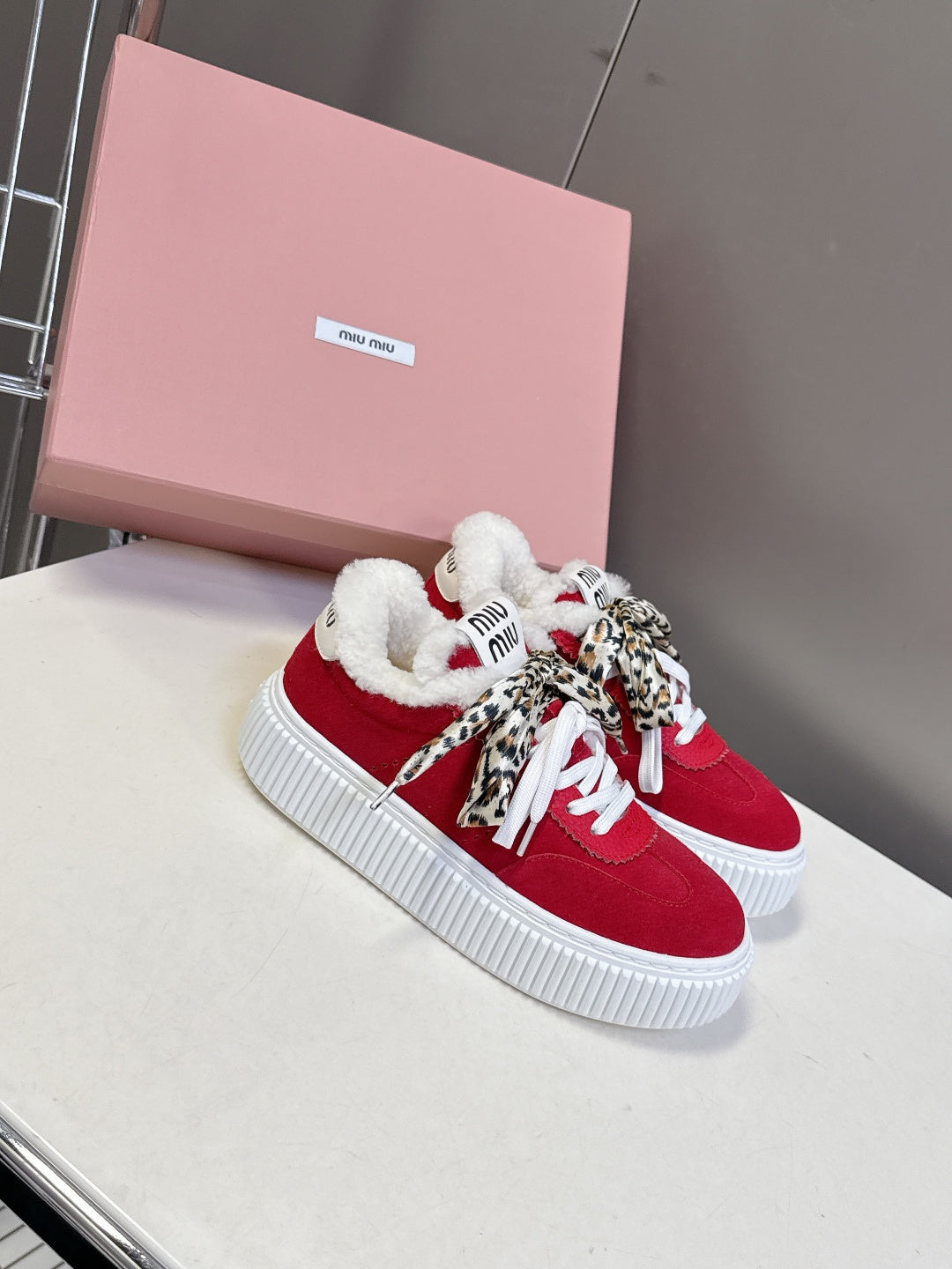 MIUMIU 25S SNEAKERS 45MM IN DARK RED SUEDE WITH LEOPARD-PRINT LACES SHEARLING