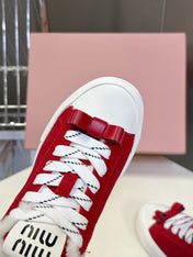 MIUMIU 25S SNEAKERS IN DARK RED SUEDE WITH SHEARLING