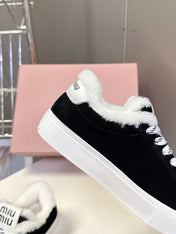 MIUMIU 25S SNEAKERS IN BLACK SUEDE WITH SHEARLING