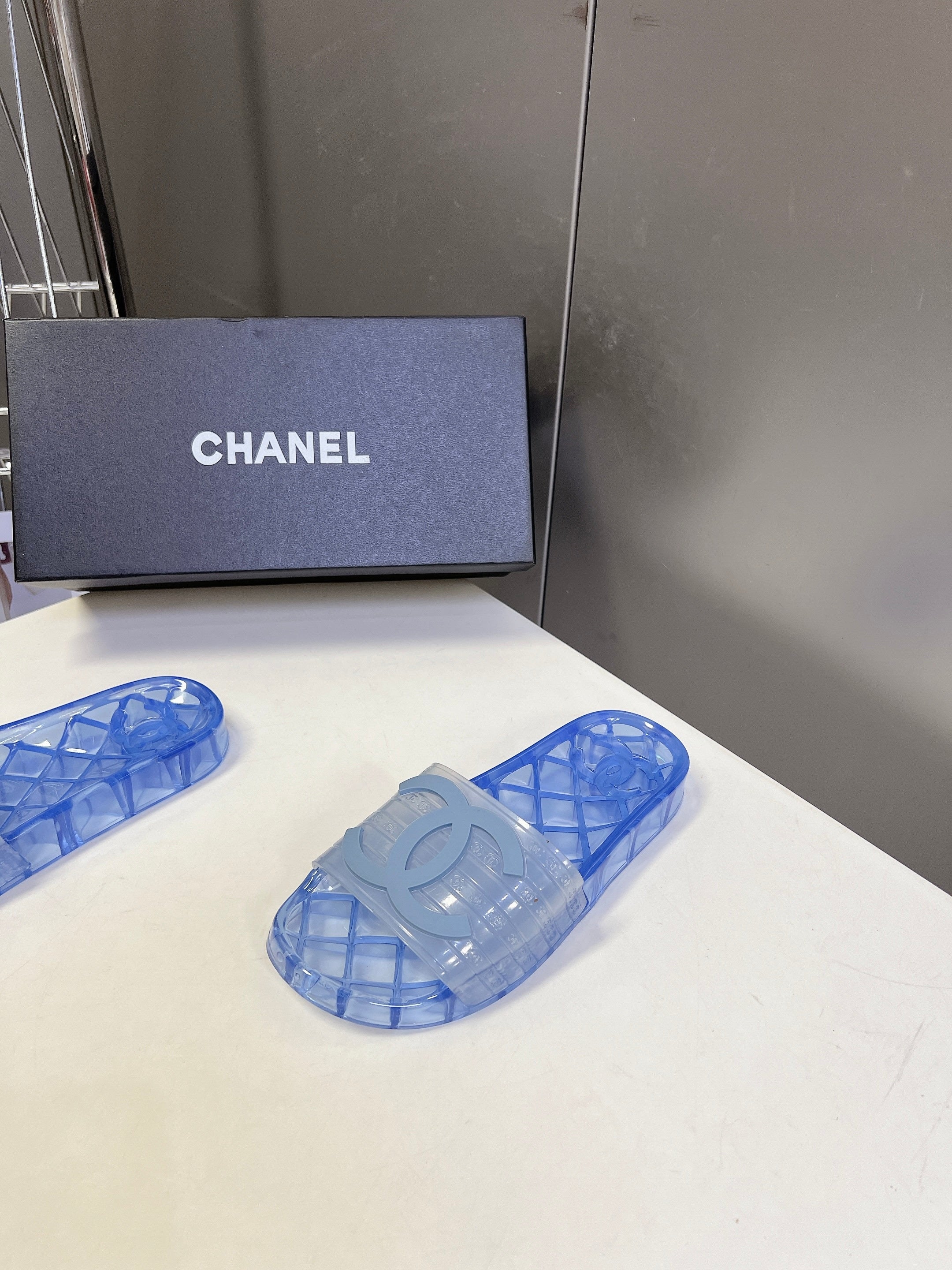 CHANEL 26S SLIDES IN BLUE PVC