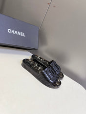 CHANEL 26S SLIDES IN BLACK PVC
