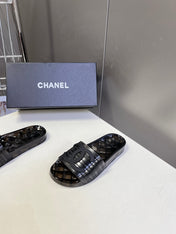 CHANEL 26S SLIDES IN BLACK PVC