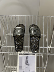 CHANEL 26S SLIDES IN BLACK PVC