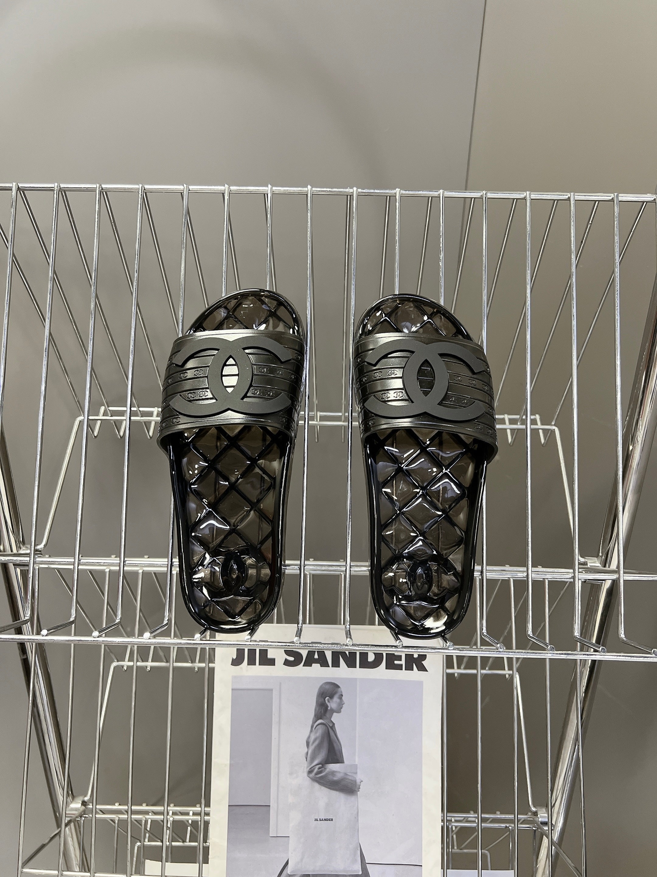 CHANEL 26S SLIDES IN BLACK PVC