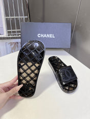 CHANEL 26S SLIDES IN BLACK PVC