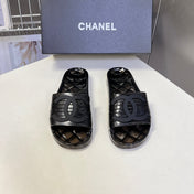 CHANEL 26S SLIDES IN BLACK PVC