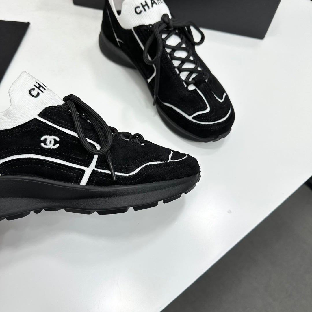 CHANEL 26S SNEAKERS IN BLACK CALFSKIN