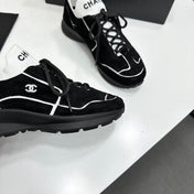 CHANEL 26S SNEAKERS IN BLACK CALFSKIN