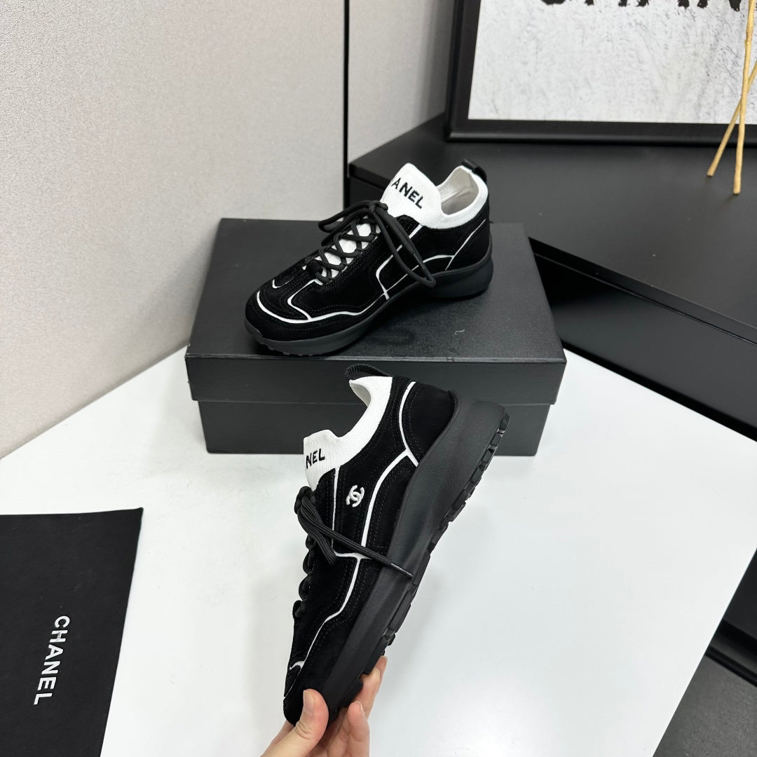 CHANEL 26S SNEAKERS IN BLACK CALFSKIN
