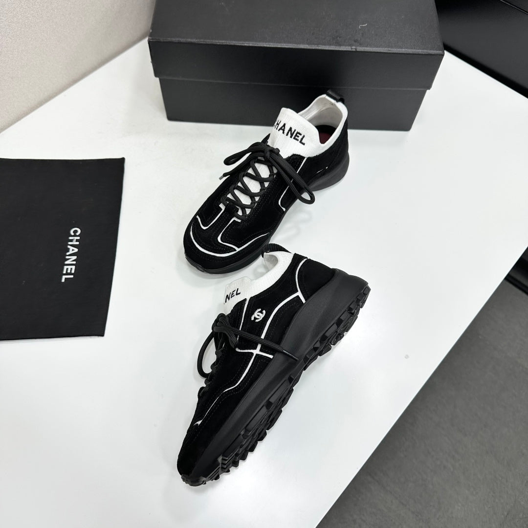 CHANEL 26S SNEAKERS IN BLACK CALFSKIN
