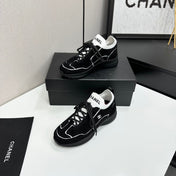 CHANEL 26S SNEAKERS IN BLACK CALFSKIN