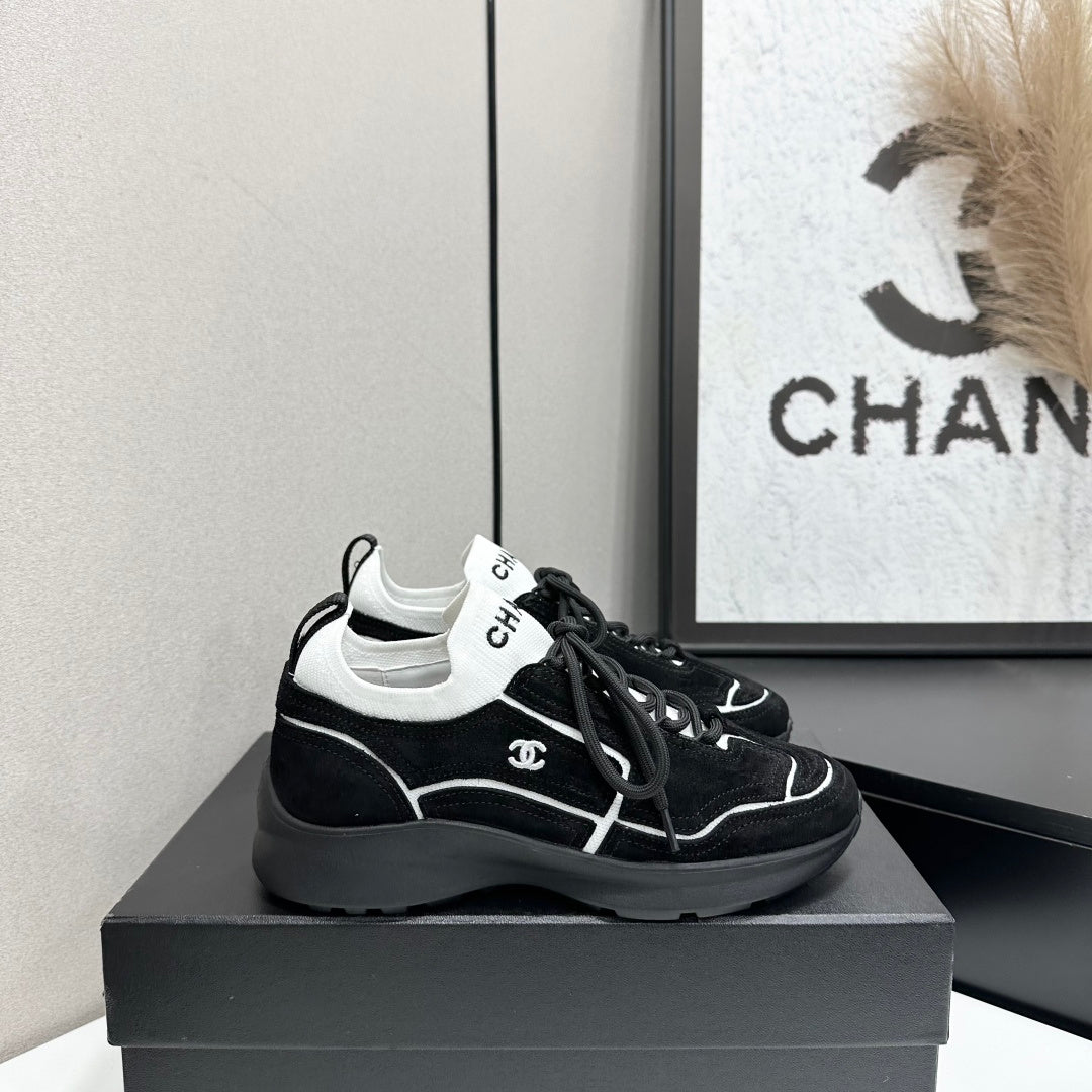 CHANEL 26S SNEAKERS IN BLACK CALFSKIN