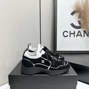 CHANEL 26S SNEAKERS IN BLACK CALFSKIN