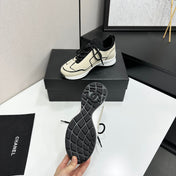 CHANEL 26S SNEAKERS IN BEIGE AND BLACK CALFSKIN