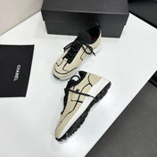 CHANEL 26S SNEAKERS IN BEIGE AND BLACK CALFSKIN