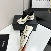 CHANEL 26S SNEAKERS IN BEIGE AND BLACK CALFSKIN