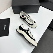 CHANEL SNEAKERS METIERS D-ART 26S IN BLACK AND WHITE CALFSKIN