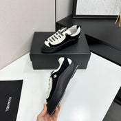 CHANEL SNEAKERS METIERS D-ART 26S IN  BLACK AND WHITE CALFSKIN MIXED FIBERS