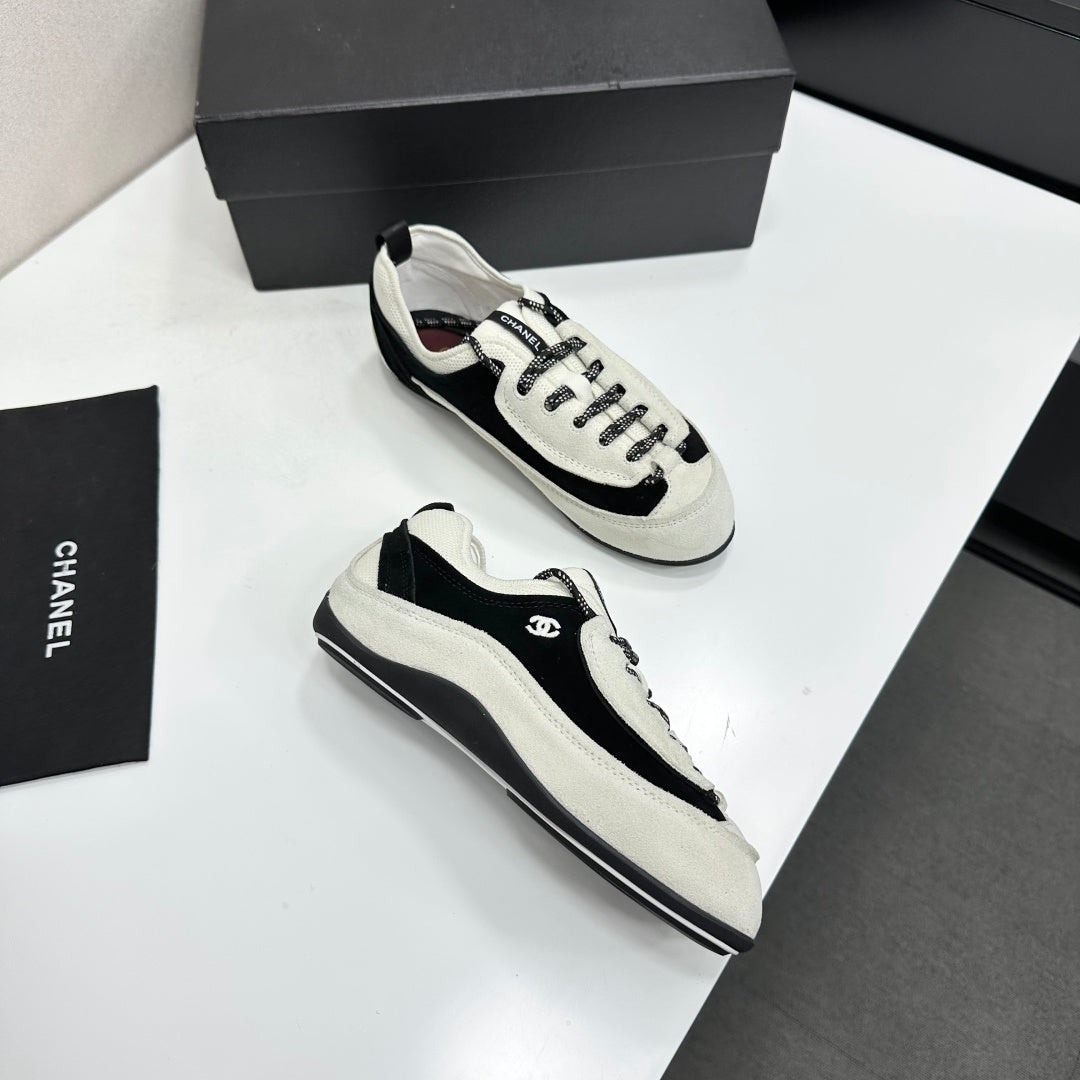 CHANEL SNEAKERS METIERS D-ART 26S IN BLACK AND WHITE SUEDE
