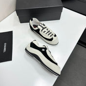 CHANEL SNEAKERS METIERS D-ART 26S IN BLACK AND WHITE SUEDE