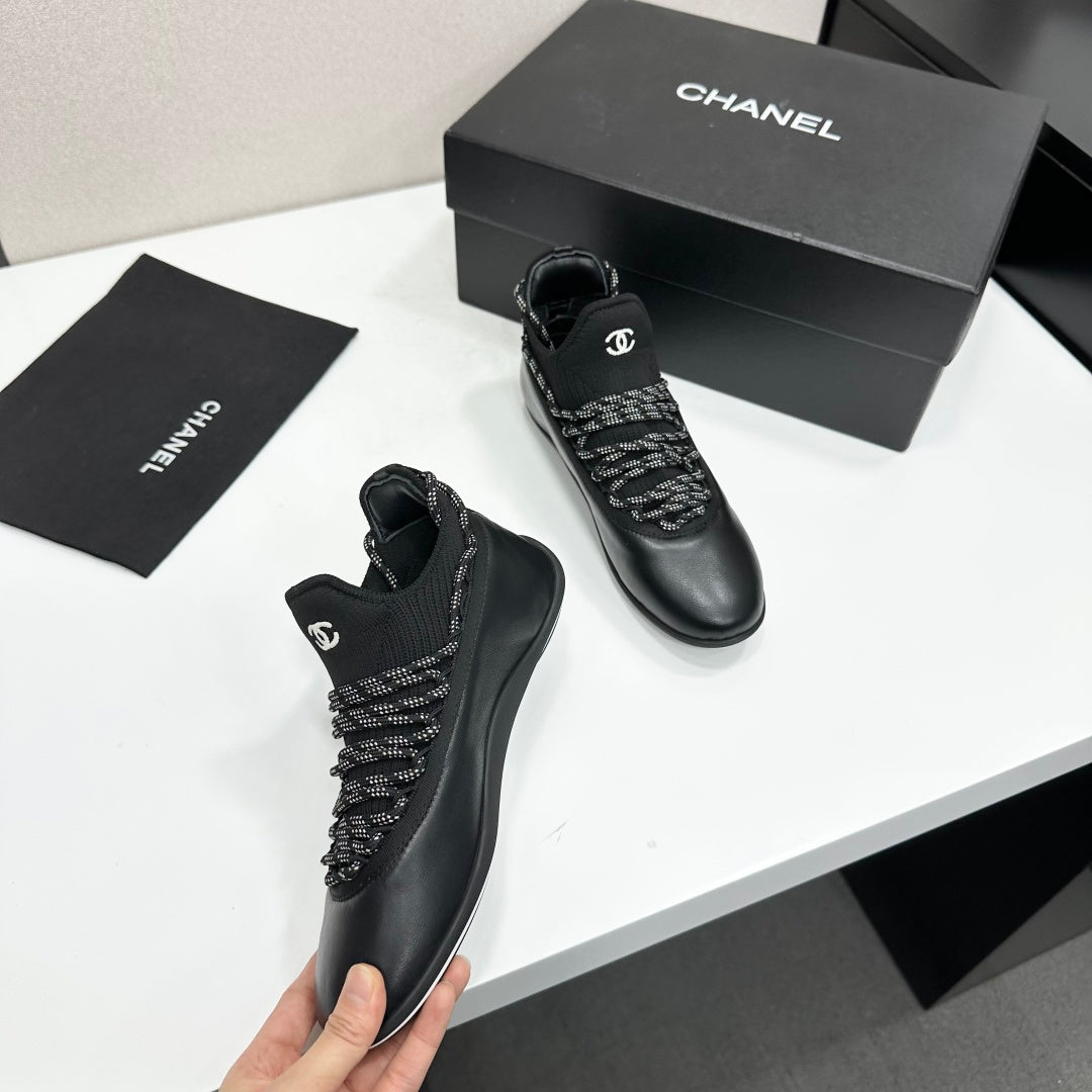 CHANEL 26S SNEAKERS IN BLACK CALFSKIN AND MESH