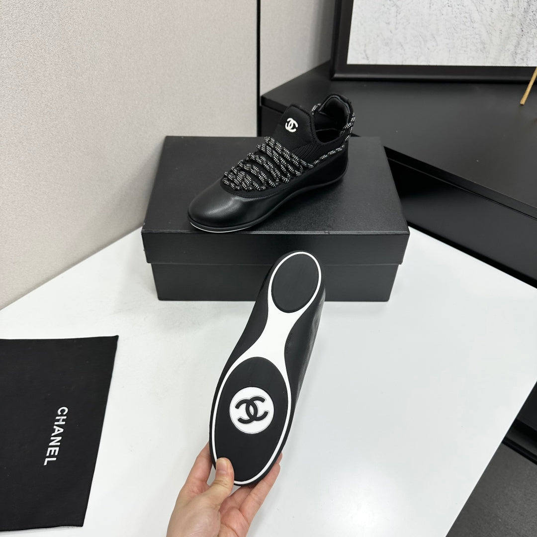 CHANEL 26S SNEAKERS IN BLACK CALFSKIN AND MESH