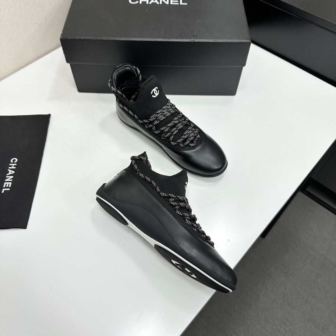 CHANEL 26S SNEAKERS IN BLACK CALFSKIN AND MESH