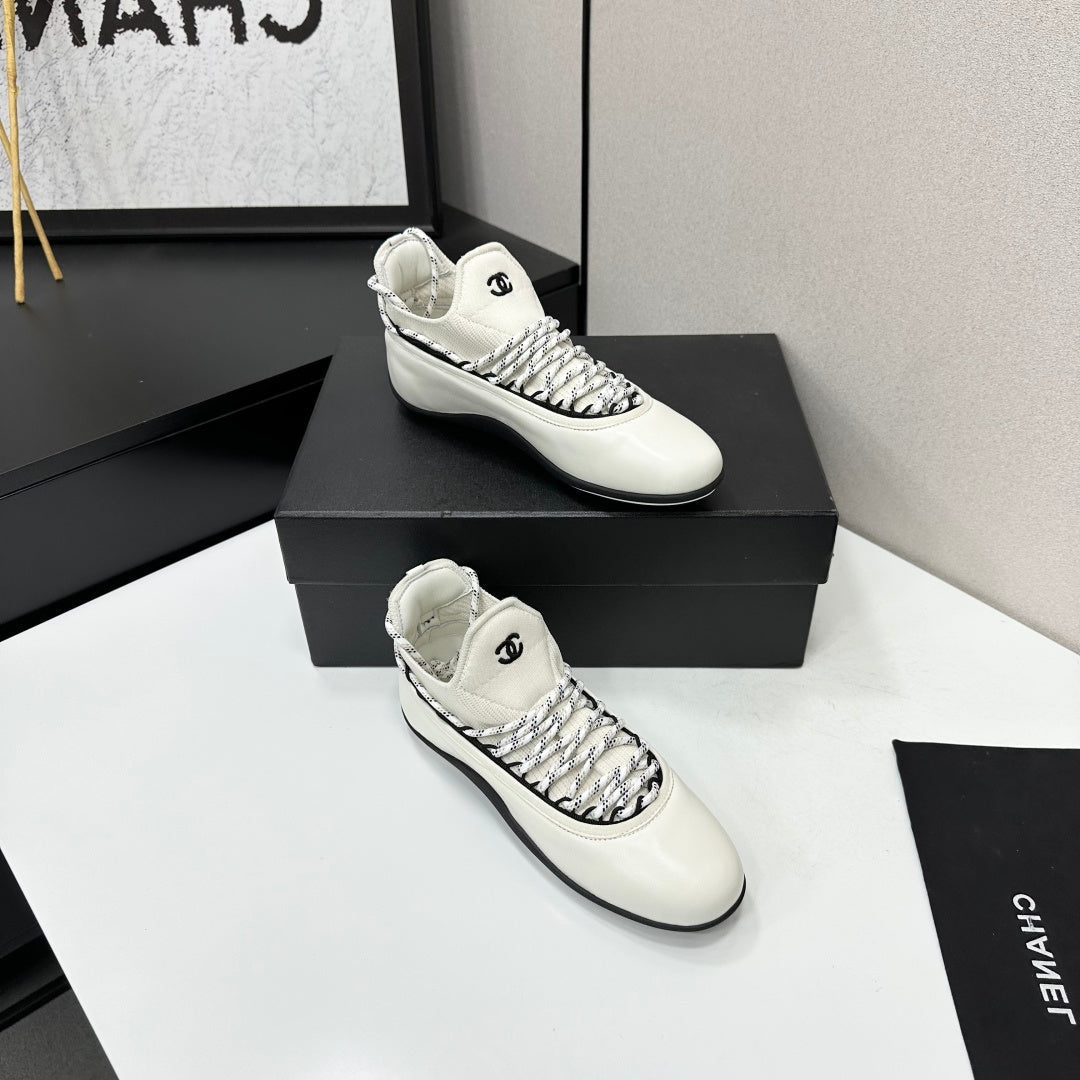 CHANEL 26S SNEAKERS IN WHITE AND BLACK CALFSKIN