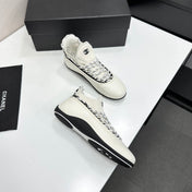 CHANEL 26S SNEAKERS IN WHITE AND BLACK CALFSKIN