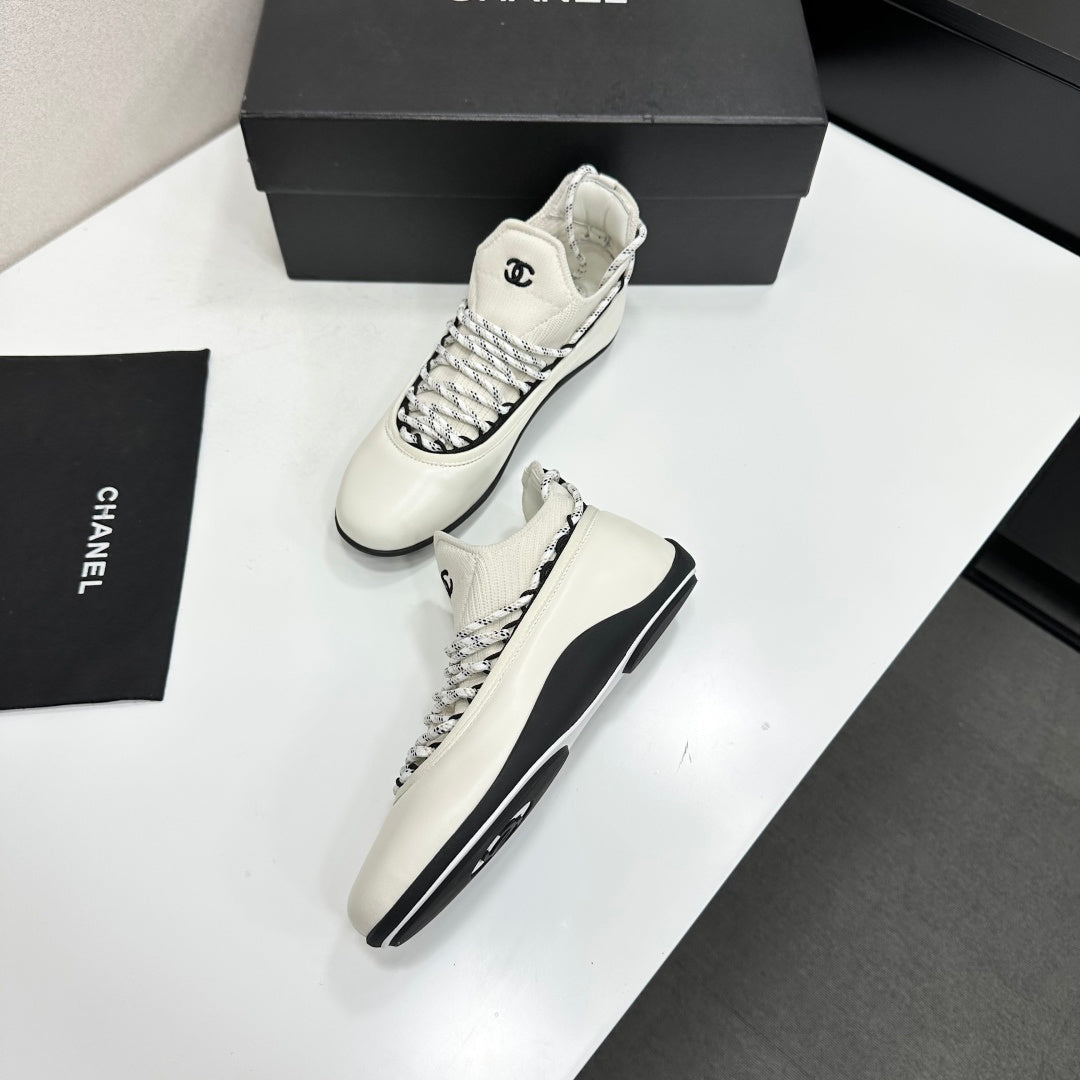 CHANEL 26S SNEAKERS IN WHITE AND BLACK CALFSKIN