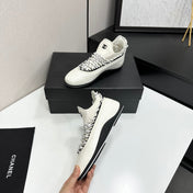 CHANEL 26S SNEAKERS IN WHITE AND BLACK CALFSKIN