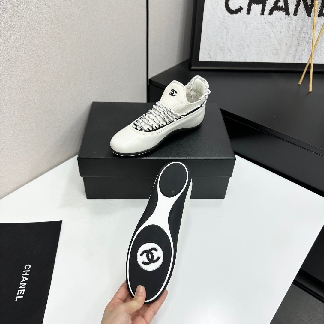 CHANEL 26S SNEAKERS IN WHITE AND BLACK CALFSKIN