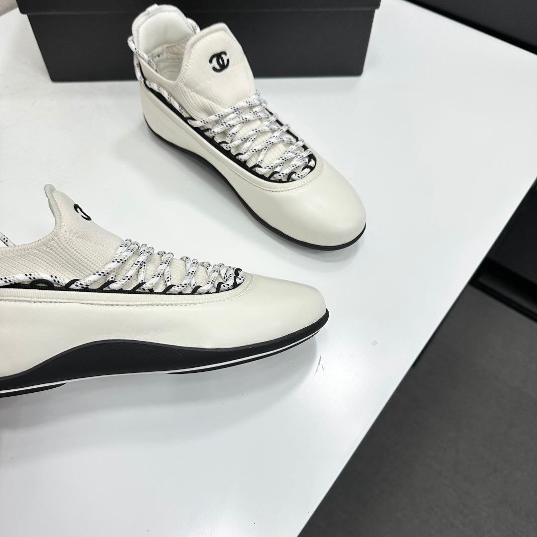 CHANEL 26S SNEAKERS IN WHITE AND BLACK CALFSKIN