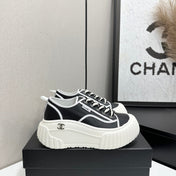 CHANEL 26S CHUNKY SNEAKERS IN BLACK AND WHITE CALFSKIN