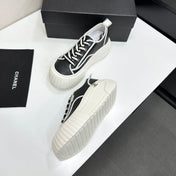 CHANEL 26S CHUNKY SNEAKERS IN BLACK AND WHITE CALFSKIN