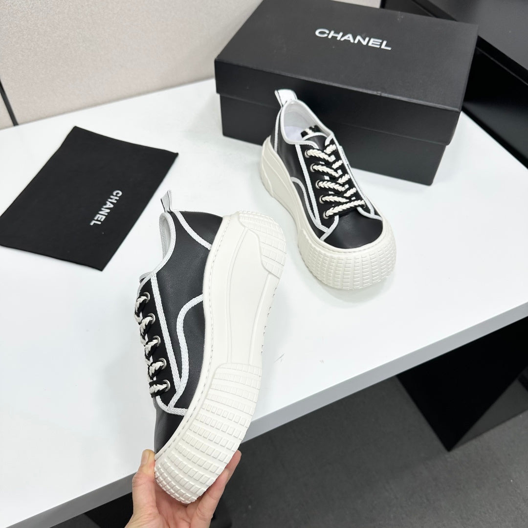 CHANEL 26S CHUNKY SNEAKERS IN BLACK AND WHITE CALFSKIN