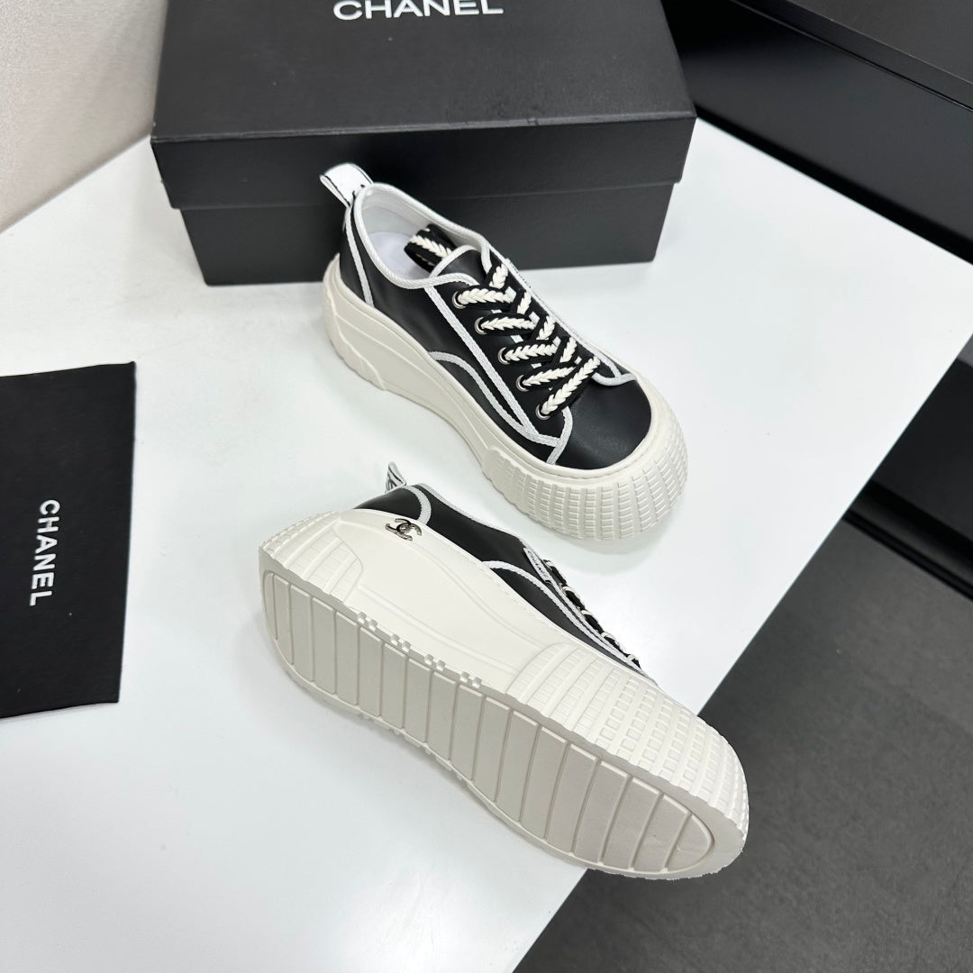 CHANEL 26S CHUNKY SNEAKERS IN BLACK AND WHITE CALFSKIN