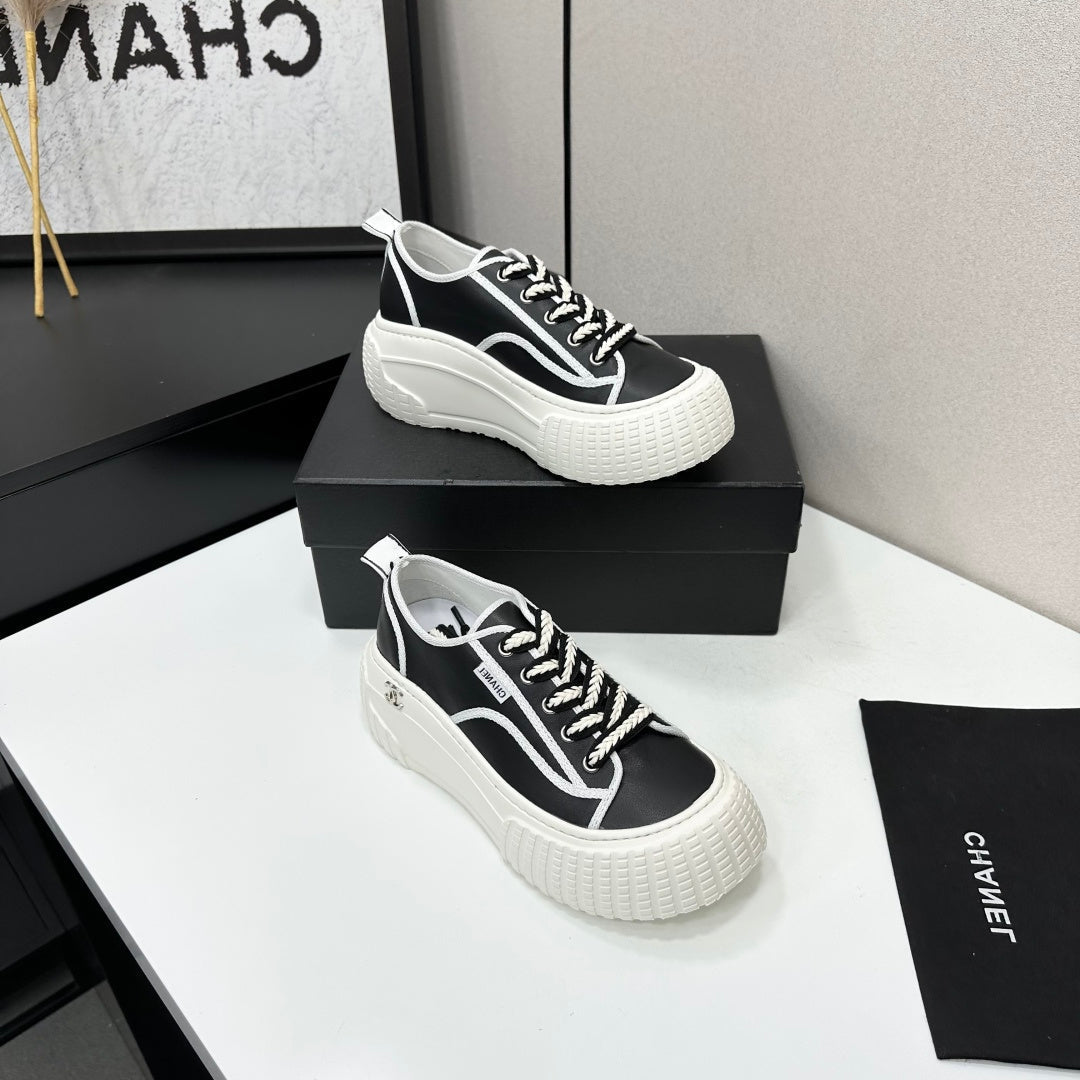 CHANEL 26S CHUNKY SNEAKERS IN BLACK AND WHITE CALFSKIN