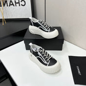 CHANEL 26S CHUNKY SNEAKERS IN BLACK AND WHITE CALFSKIN