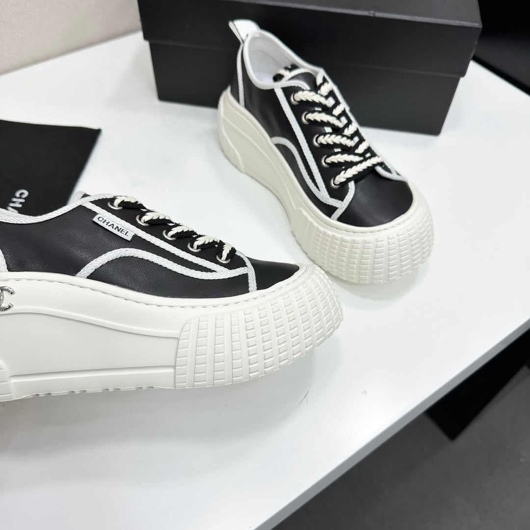 CHANEL 26S CHUNKY SNEAKERS IN BLACK AND WHITE CALFSKIN
