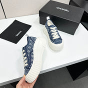 CHANEL 26S SNEAKERS IN NAVY BLUE DIAMOND-PATTERNED WOVEN FABRIC