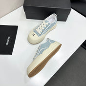 CHANEL 26S SNEAKERS IN LIGHT BLUE CHECKERED WOVEN FABRIC