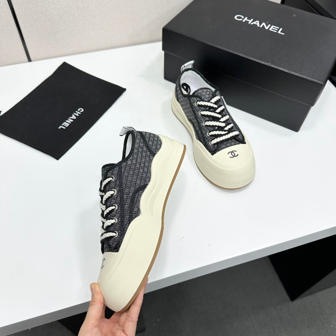CHANEL 26S PLATFORM SNEAKERS IN BLACK CHECKERED WOVEN FABRIC
