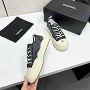 CHANEL 26S PLATFORM SNEAKERS IN BLACK CHECKERED WOVEN FABRIC