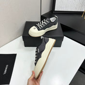 CHANEL 26S PLATFORM SNEAKERS IN BLACK CHECKERED WOVEN FABRIC