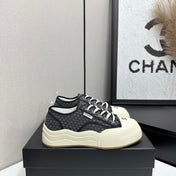 CHANEL 26S PLATFORM SNEAKERS IN BLACK CHECKERED WOVEN FABRIC