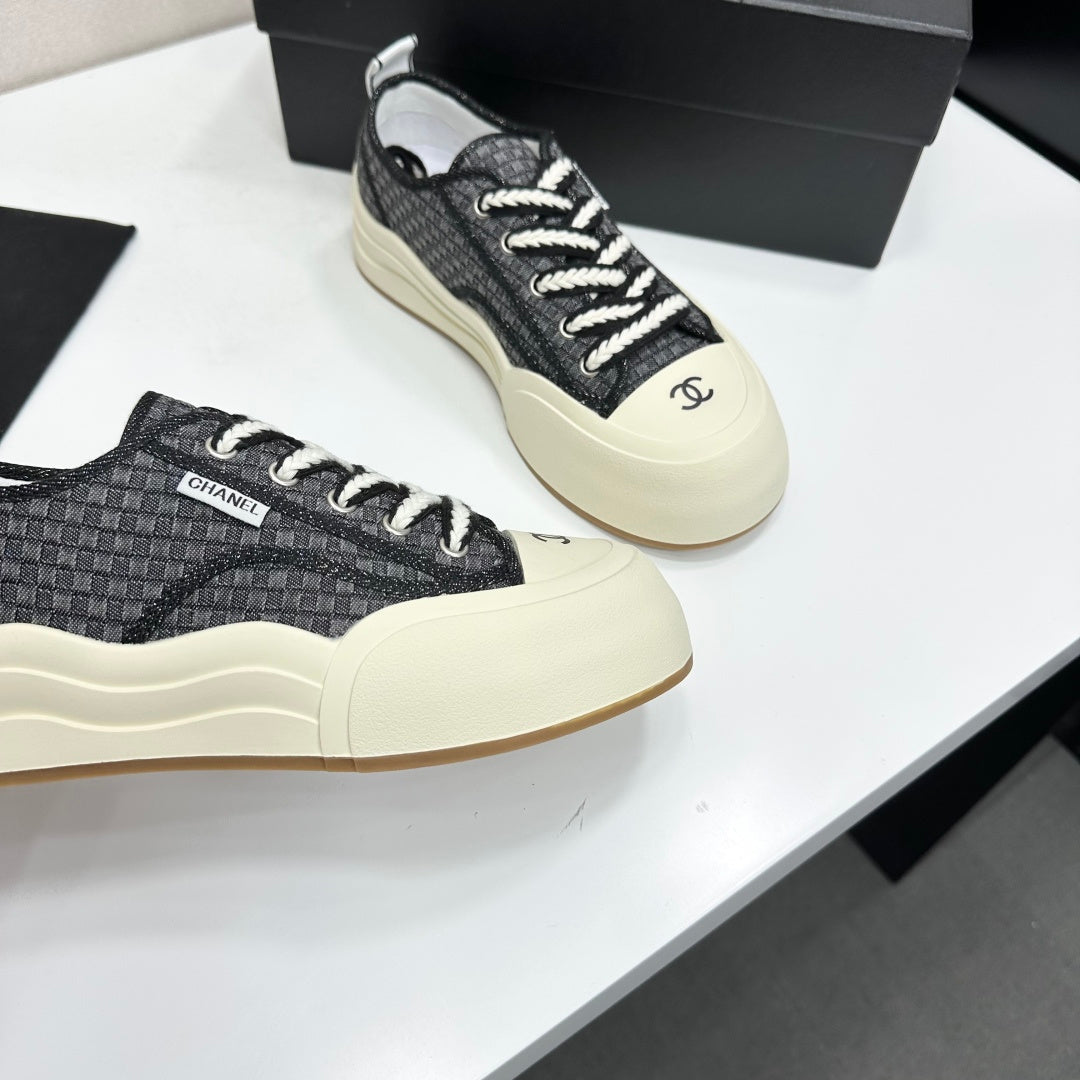 CHANEL 26S PLATFORM SNEAKERS IN BLACK CHECKERED WOVEN FABRIC